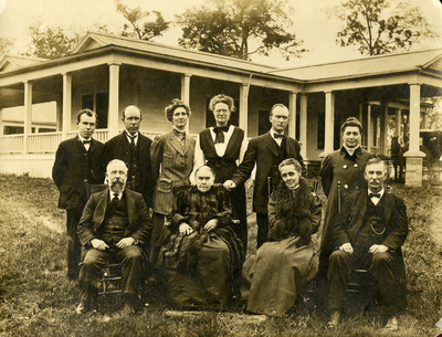 Ellen G. White posing with personal staff and administrators of Madison College