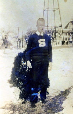Male Student in Letterman Sweater
