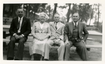 This is Dora Allen and Clother Allen and two sons. There was another son that was in India for a long time. Aunt Dora will soon be a hundred and four years. Dora Allen. Clother Allen was church elder.