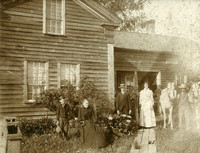 Kimble family in front of their home in Elmira, NY