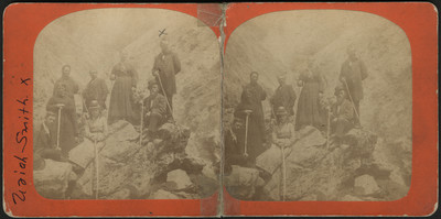Group of attendees at the 1882 California camp meeting posing by the Witches' Cauldron at Geyser Canyon