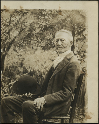 Sidney Brownsberger seated outside during his later years