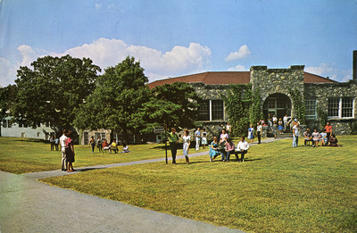 People socializing in front of the Science Building at Madison College