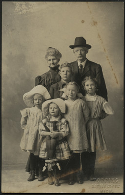 Unidentified grandparents with 5 grandchildren