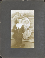 Joseph Sutherland about 2 years old posing on a stool