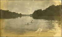Unidentified men in the Cumberland River